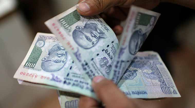 Rupee spurts 8 paise against dollar