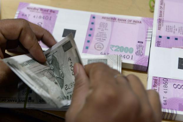 Rupee softens 10 paise against US dollar