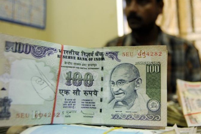 Rupee slides 15 paise against dollar