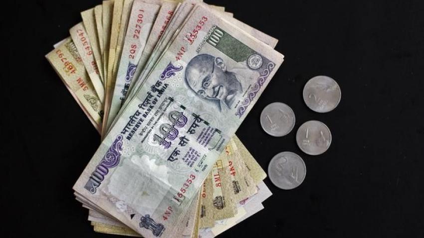 Rupee falls by 17 paise against US dollar