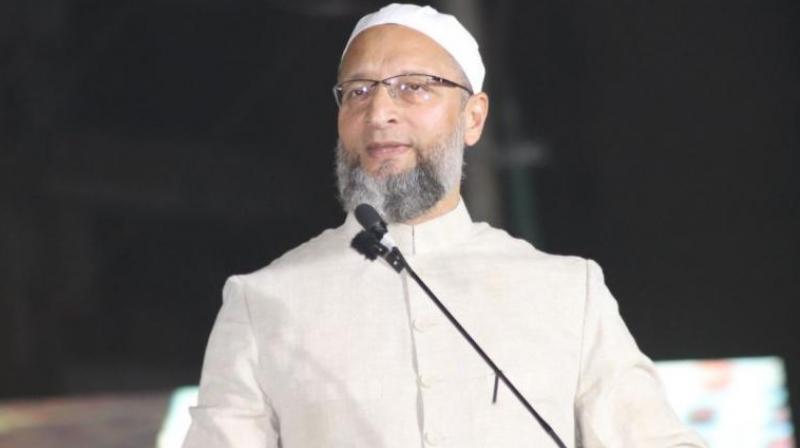 asaduddin-owaisi-criticises-the-bjps-hyderabad-ls-poll-candidate-madhavi-latha-for-making-an-objectionable-gesture-of-pointing-an-arrow-towards-a-religious-place