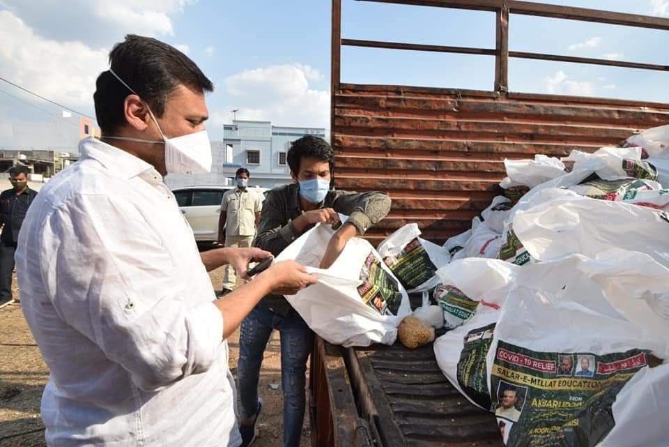 Karwan MLA Kausar Mohiuddin receive ration kits from Floor Leader Akbaruddin Owaisi to be distributed under his division