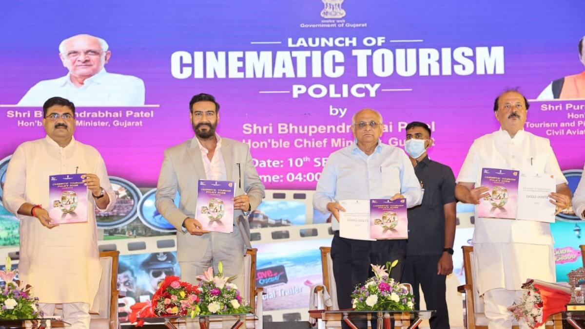 gujaratcmunveilscinematictourismpolicyajaydevgnsignsmouforfilminfrastructure