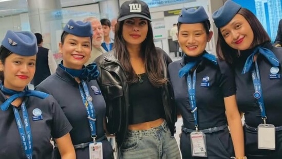 priyankachoprareturnindiafortheshootofssmb29poseswithairportstaffinodisha
