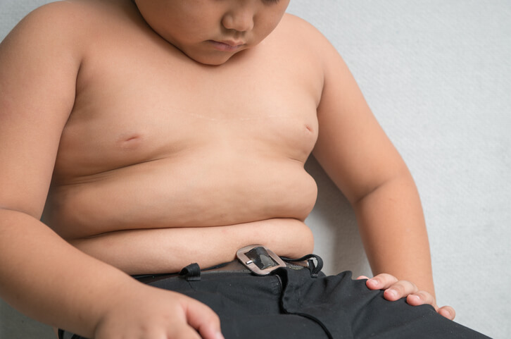 Study finds obesity a possible contributor to early menarche in girls