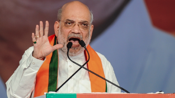 unionhomeministeramitshahaddressesarallyindhuledistrict