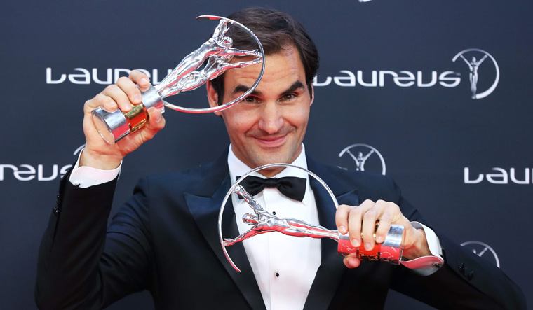 rogerfedererbagstwinhonoursinmonacobecomesmostdecoratedlaureusawardwinner