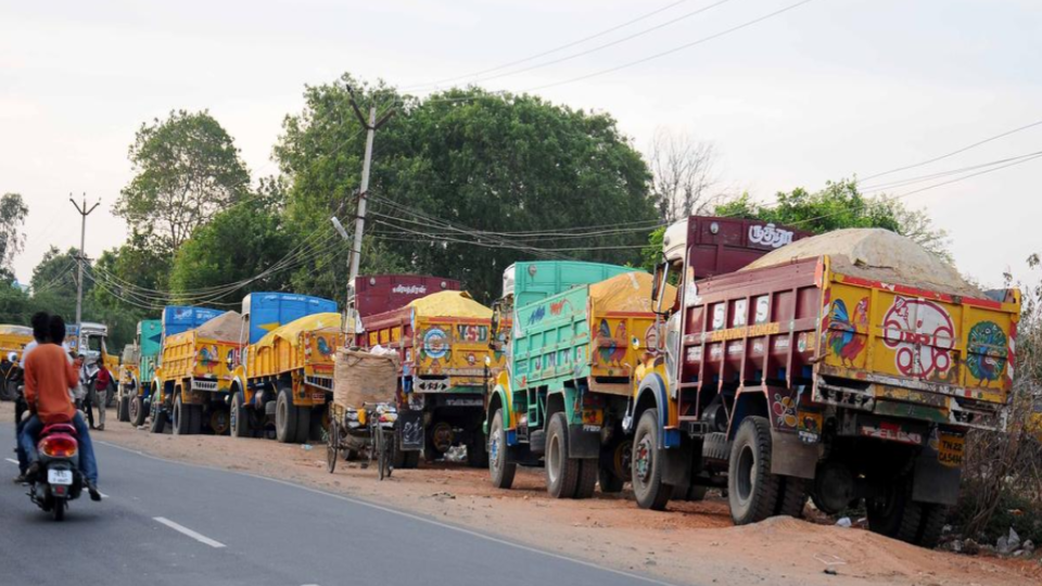 sand-lorry-owners-protest-mandatory-radium-sticker-charges-in-telangana