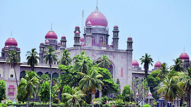 noimmersionofpopidolsinlakes:telanganahighcourt