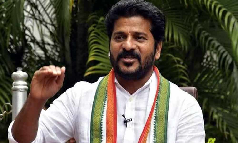 Revanth Reddy demands compensation to farmers for crop loss
