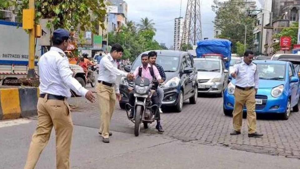 Traffic Police books scooter rider for using fake reg number in Hyderabad