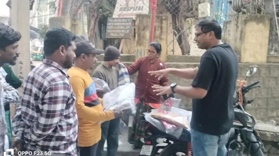 Techie distributes sweaters to GHMC workers in Irrum Manzil