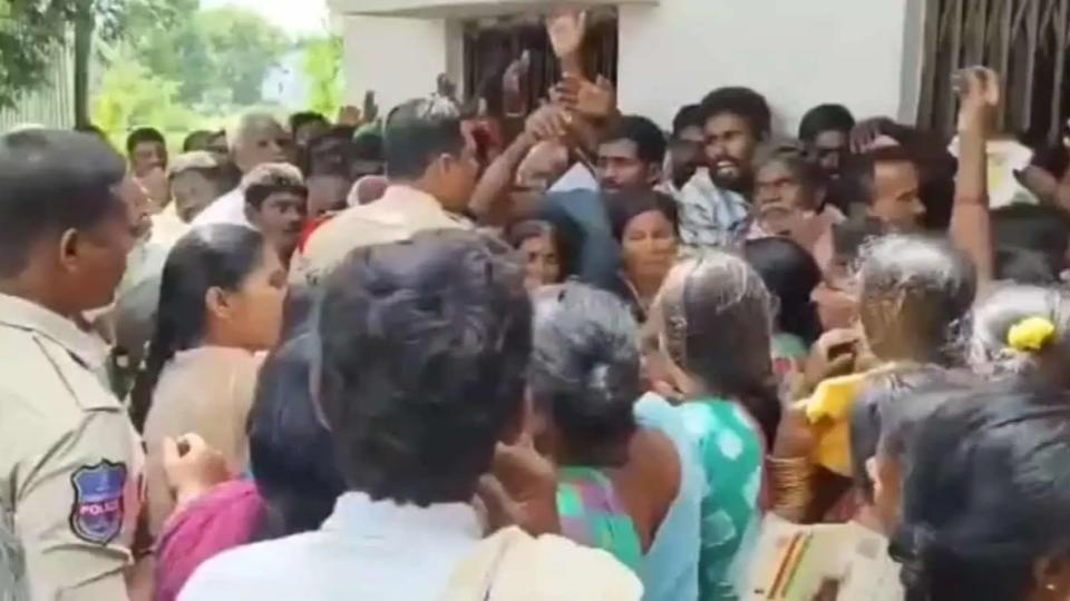 Police officer slaps farmer standing for urea in Mahbubnagar