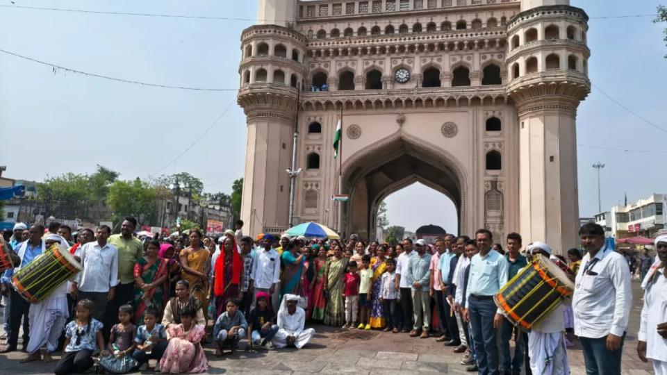 Adilabad Tribal Group Gets Traditional Welcome at Charminar