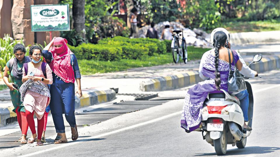 imdhyderabadissues‘redalert’forpartsofstatenightstoremainwarmer