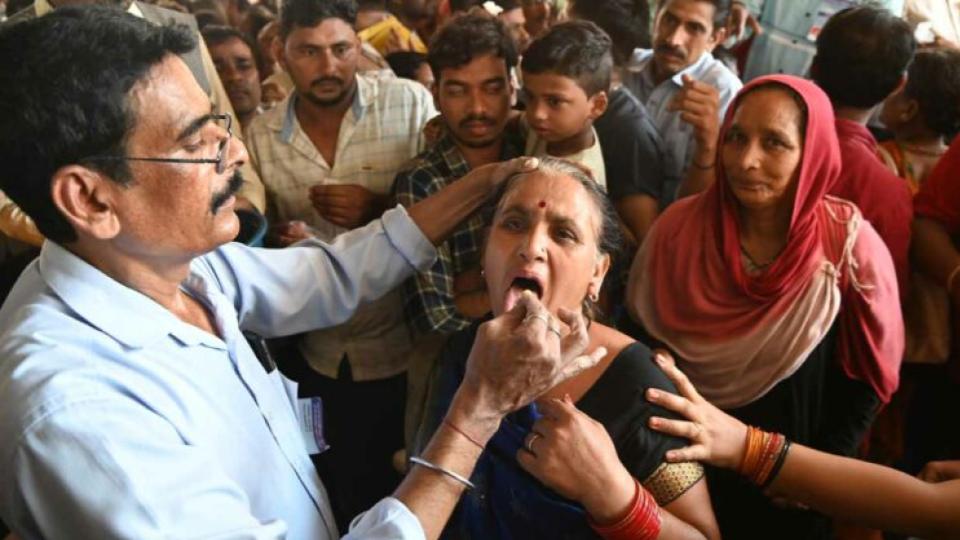 People Throng Nampally Exhibition Grounds for Fish Prasadam