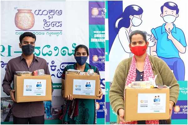 grocerykitsdistributedtovaccinatedpersonsinsangareddy: