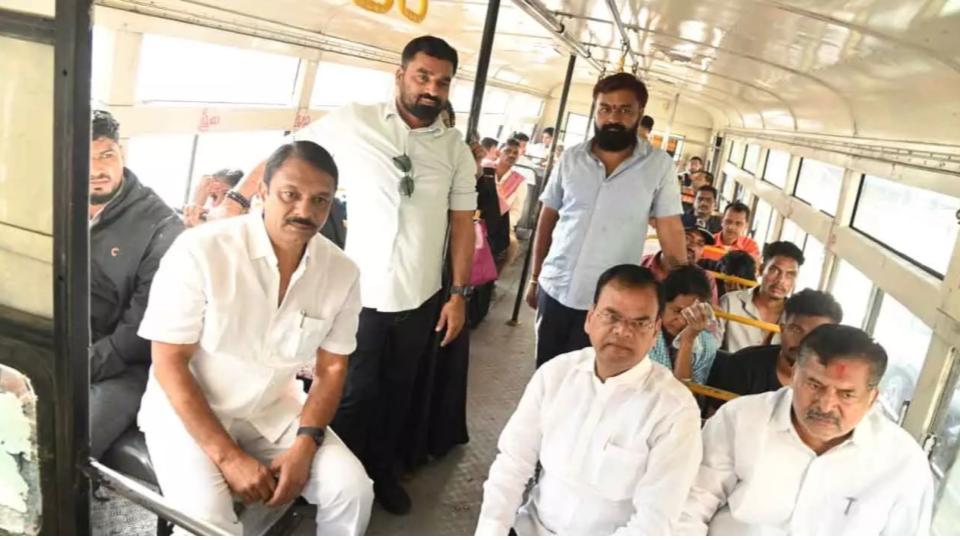 BRS MLAs travel in RTC bus to protest fare hike