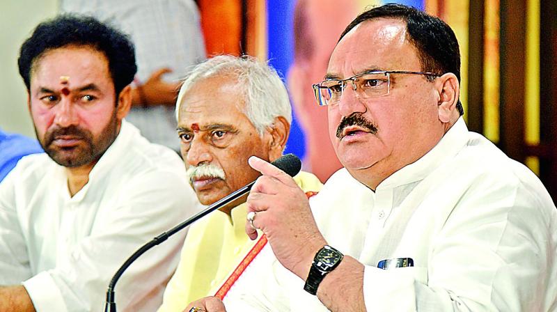 bjppresidentjpnaddaallegesthatcmkcrandhisfamilylootingtelanganastate