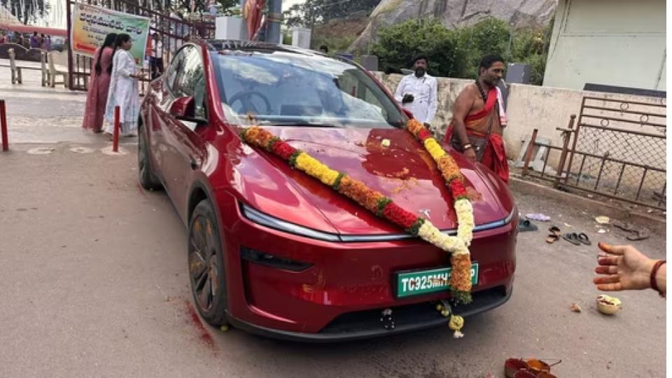 Doctor performs vahan pooja for Tesla in Hyderabad