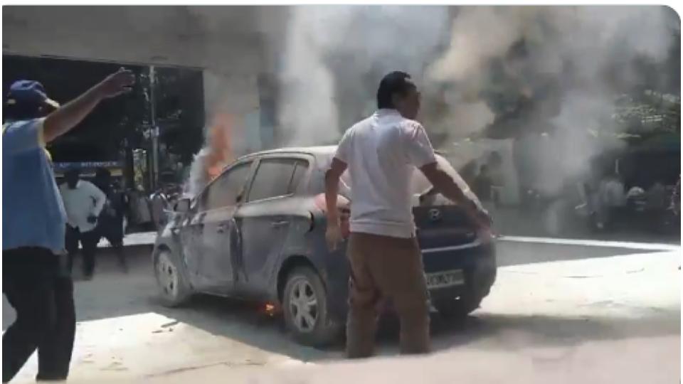 Video of Car catches fire at petrol pump in Punjagutta