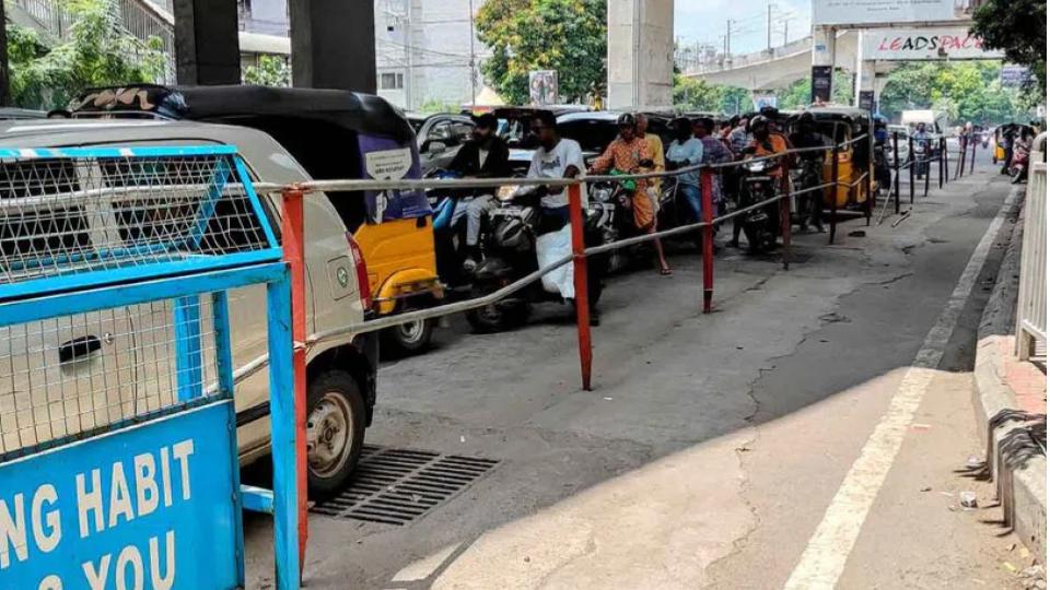 Barricades for queue lines obstruct Khairatabad road users