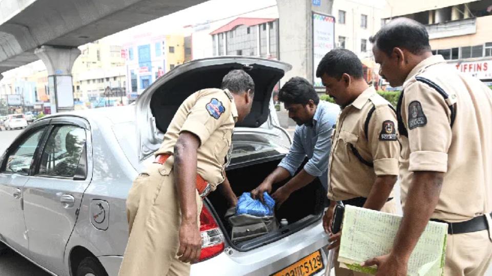 Hyderabad police seize Rs 4 lakh cash, liquor bottles in Punjagutta