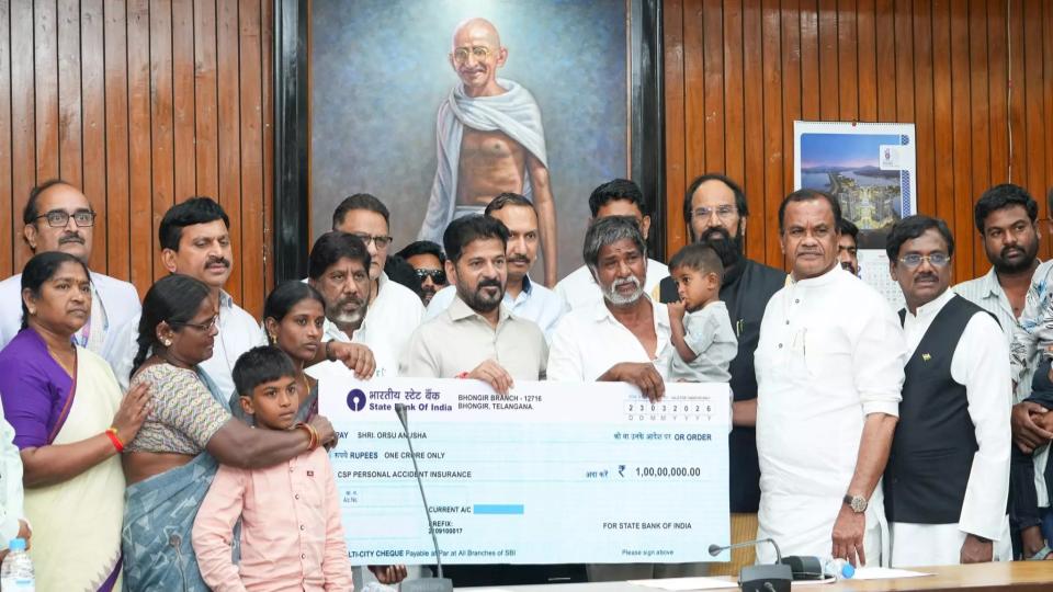 CM Revanth Presents Rs.1 Cr Insurance to Kin of Deceased Power Staff