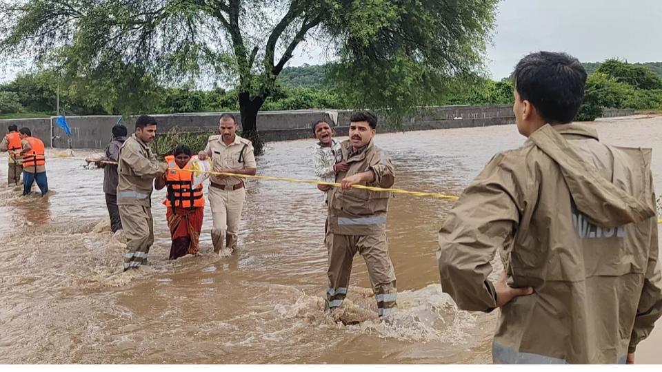 Six Family Members Rescued from Floodwaters in Adilabad