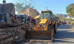 ghmcdemolishesencroachmentsonfootpathsinuppal