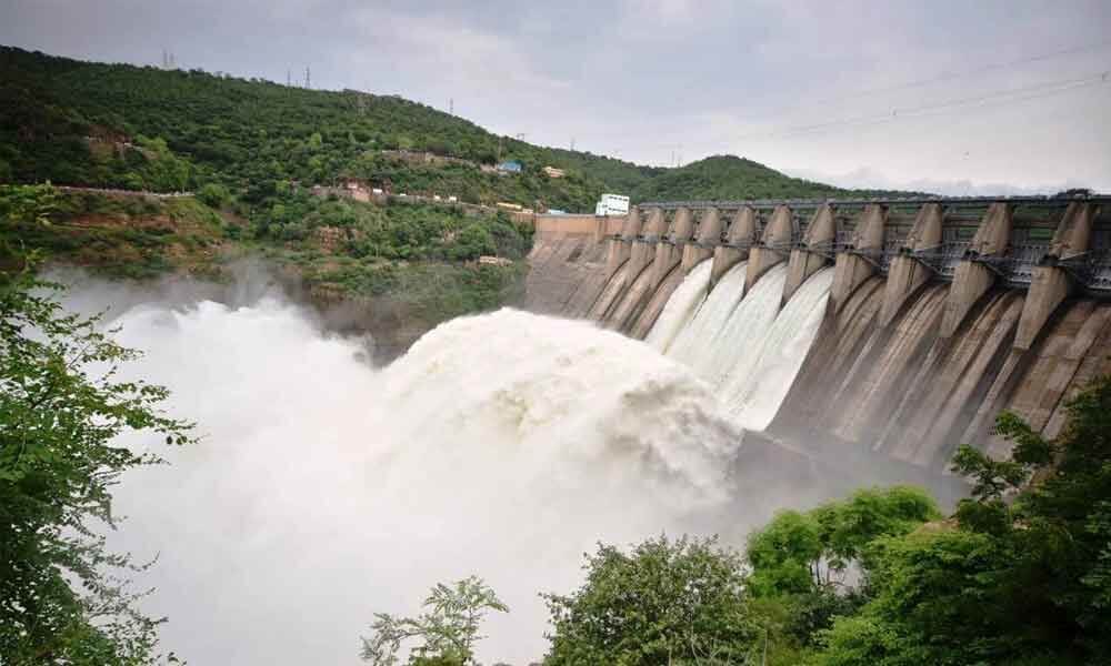 twomoregatesliftedatsrisailamafterheavyfloodinflow