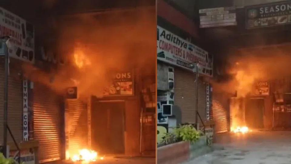 mobile shop store catches fire in Kukatpally