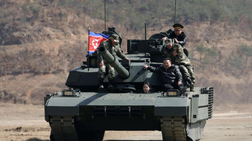 Kim Jong And His Daughter Drives New Tank That Can Repel Drones