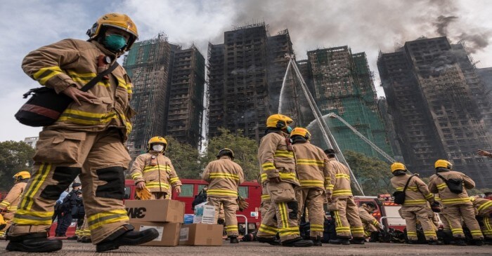 Hong Kong’s worst blaze in 70 years leaves 83 dead, rescuers battle to reach trapped residents
