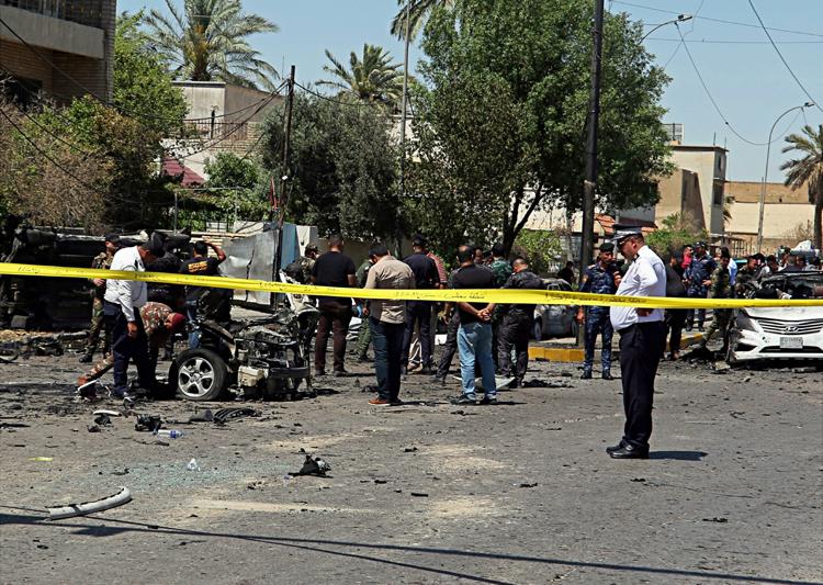 bombblastkills13hurts24inbaghdad;isclaimsresponsibility