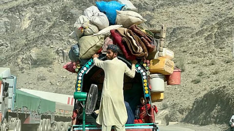 Over 6,000 Afghan refugees return home in a single day