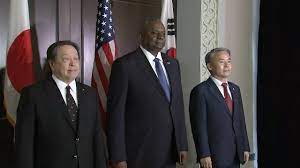 Japan, US and South Korea agree to upgrade their security relationship to enable real-time monitoring of missiles launched by North Korea