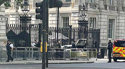 Car collides with the front gates of Downing Street in London, police don