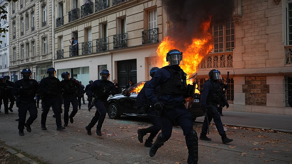 French police arrest 855 people in Paris as protests, violence erupt across country
