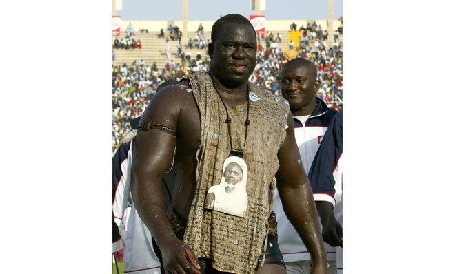senegalwrestlingstarthrowsinloinclothafter24years