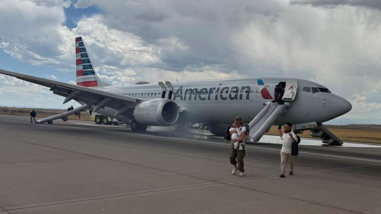 Passengers Safely Evacuated After Landing Gear Fire on American Airlines Flight AA3023 at Denver Airport