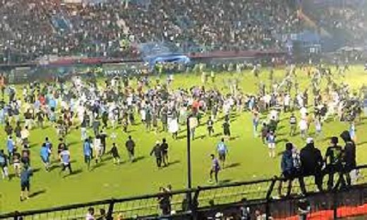Indonesia football riot: 129 people killed after stampede at local  league match