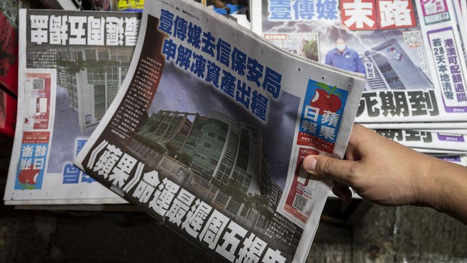 hongkongsprodemocracynewspaperappledailyshutsamidseverecrackdownfrombeijing