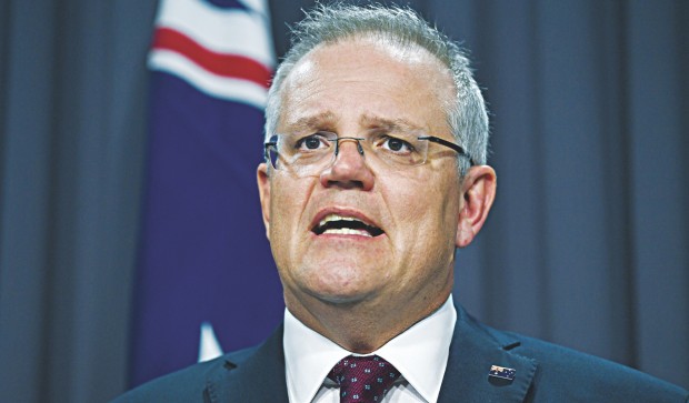 australianpmscottmorrisonexpressesregretoverhandlingofbushfirecrisis