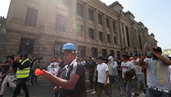 protestersmarchinstreetsdemandinganticorruptionreforminperu