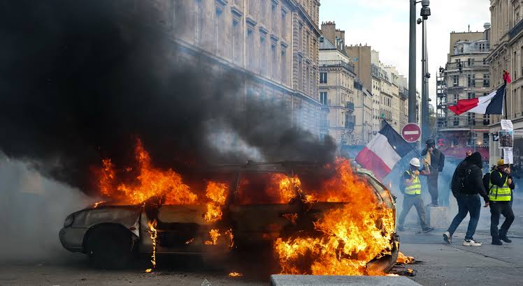 France buildings burn, luxury shops looted as 500,000 take to streets over rising living costs