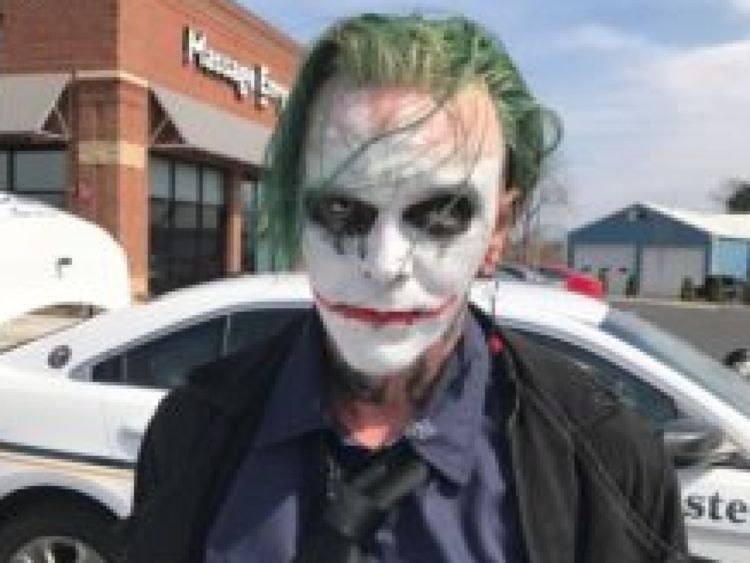 maninjokermaskarrestedbyuspolice