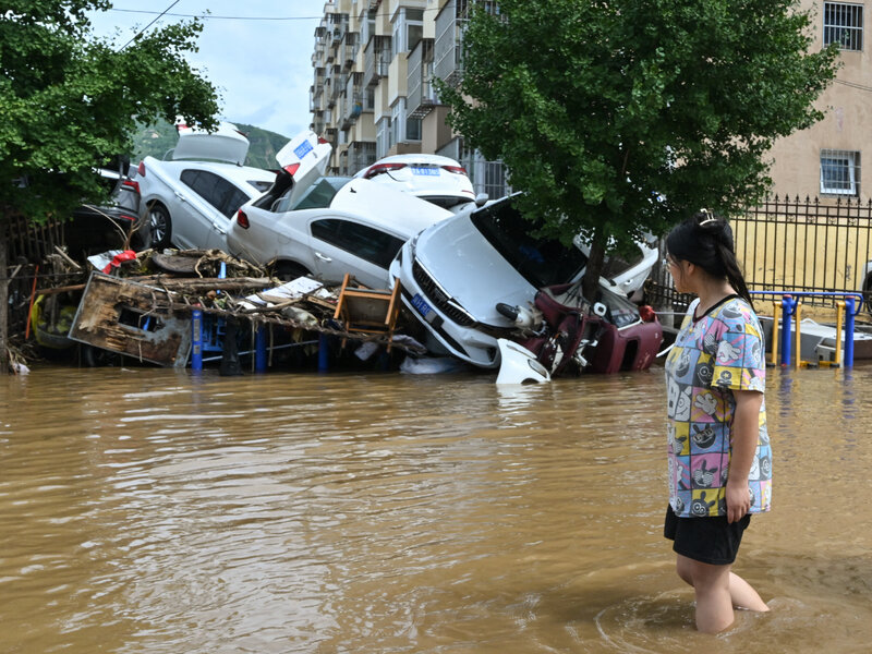 Over 34 killed, thousands evacuated as heavy rain & flooding Hit Beijing