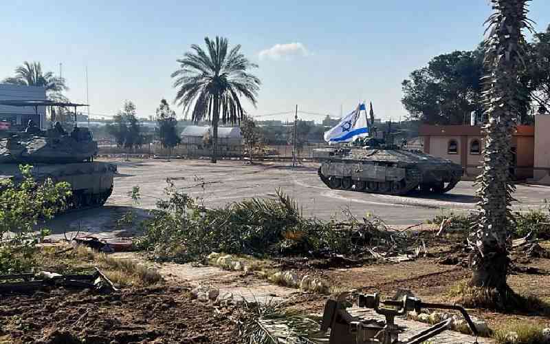 Israel shells Rafah as Biden vows arms suspension