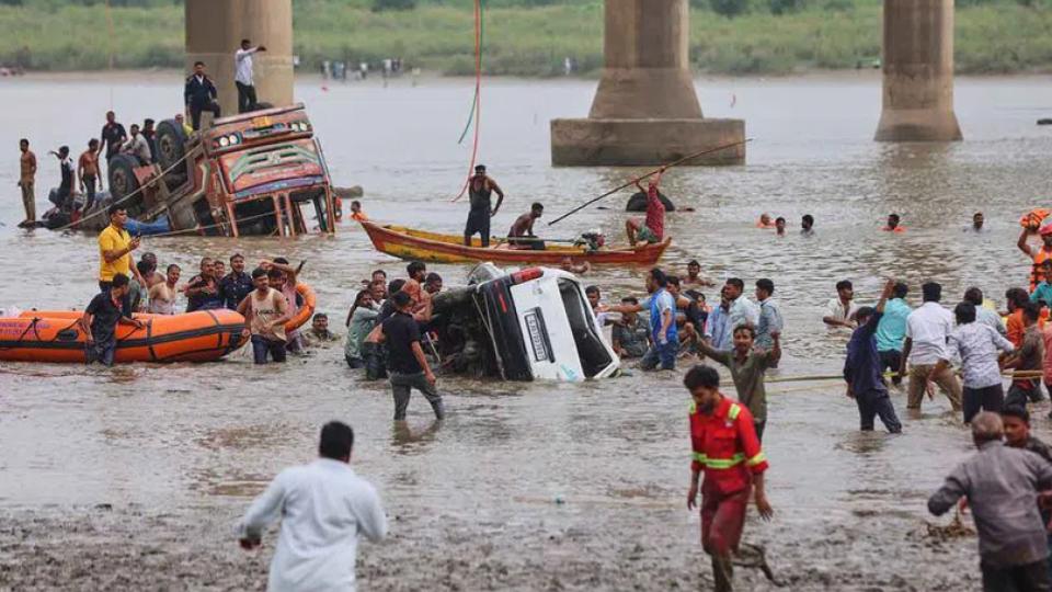 Nine killed as vehicles fall into river after bridge collapse in Gujarat